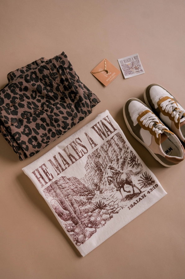 Casual outfit with inspirational message.