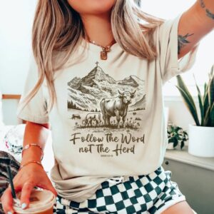Woman wearing cow-themed graphic tee